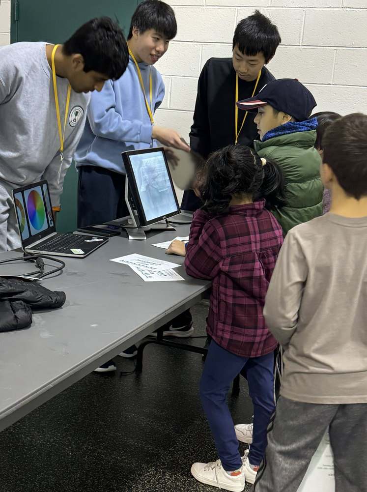 Students helping with technology